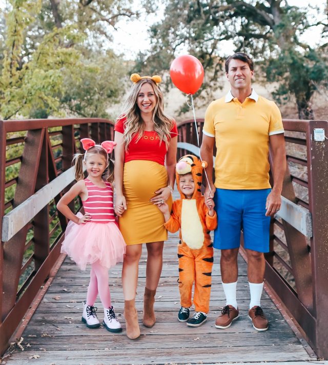 Disney's Winnie the Pooh family Halloween costume with pregnant mom